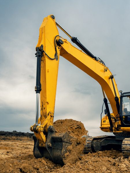 A,Large,Construction,Excavator,Of,Yellow,Color,On,The,Construction A,Large,Construction,Excavator,Of,Yellow,Color,On,The,Construction